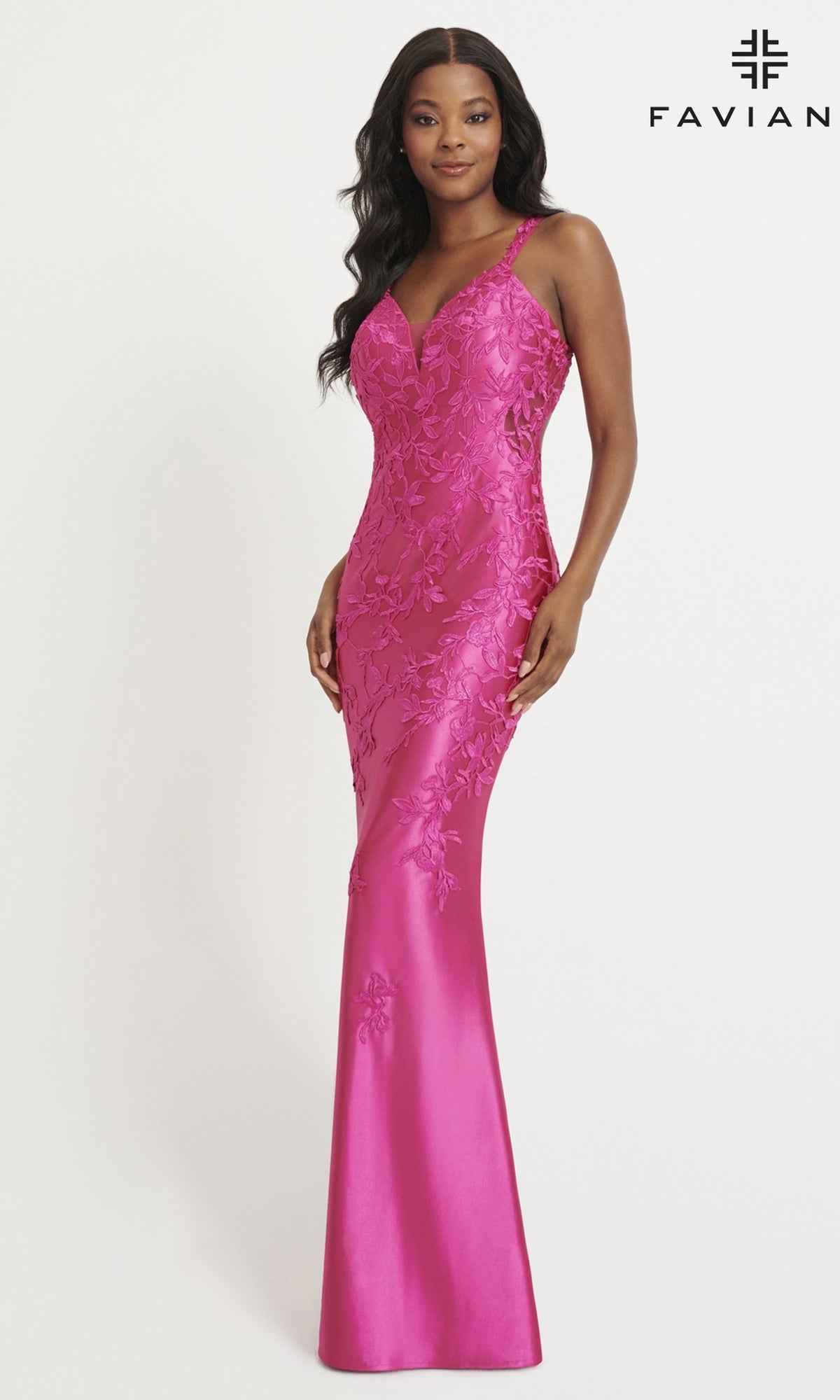 A woman poses in the Faviana Tonal-Lace Long Prom Dress 11082, a fitted, floor-length bright pink stretch satin gown with floral lace details. The Faviana logo is displayed in the top right corner against a white background.